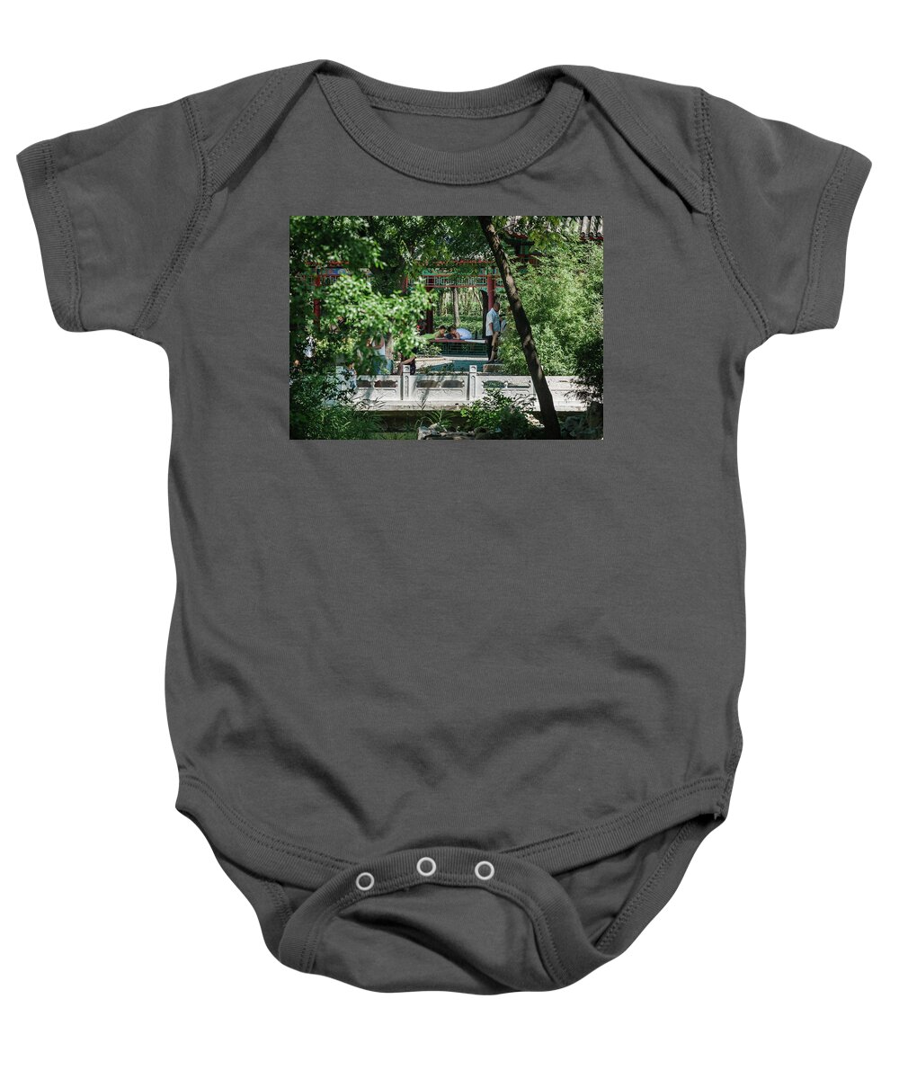 2013 Baby Onesie featuring the photograph Children playing in a park of Tianjin City by Benoit Bruchez