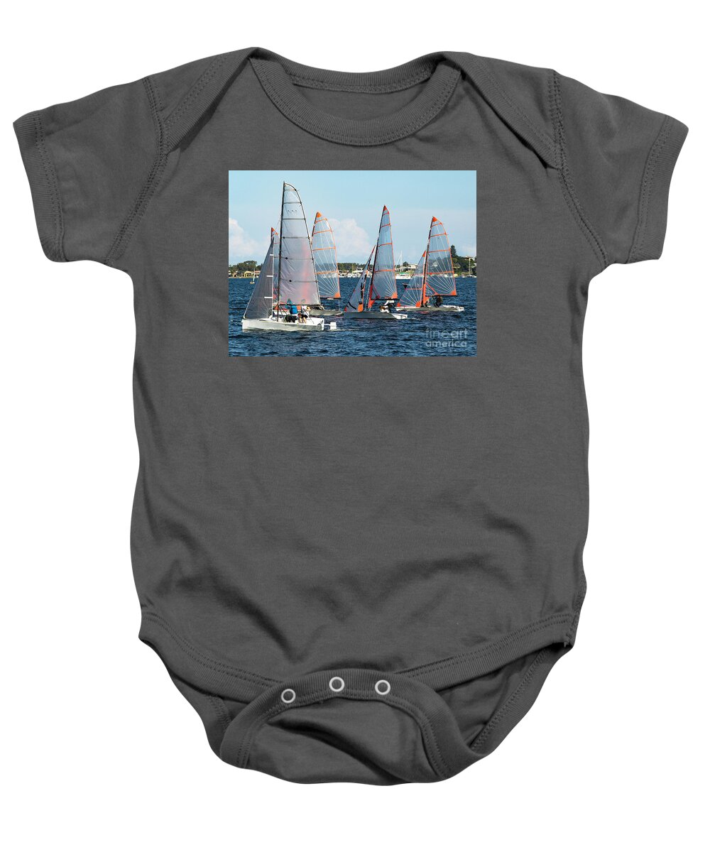 Cloud Baby Onesie featuring the photograph Children Sailing, class racing in 29er dinghies in a high school by Geoff Childs