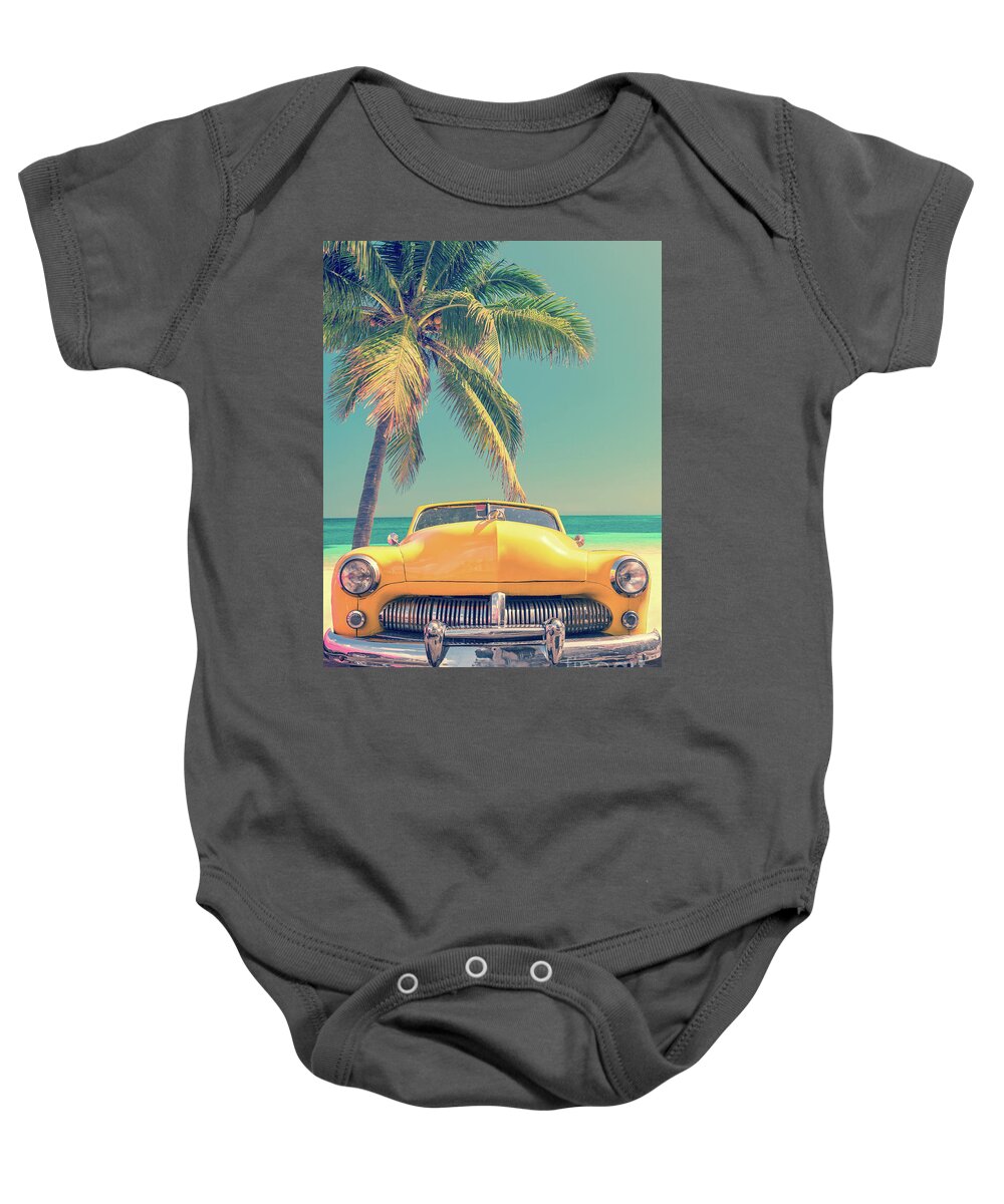 Car Baby Onesie featuring the photograph Classic car and palm tree by Delphimages Photo Creations