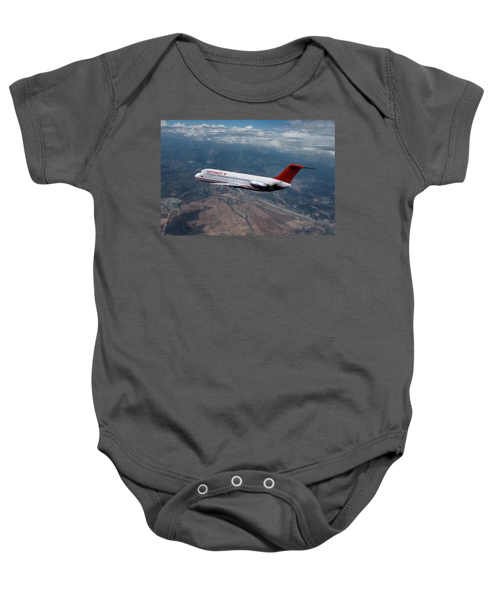 Northwest Orient Airlines Baby Onesie featuring the mixed media Classic Northwest Airlines DC-9 by Erik Simonsen