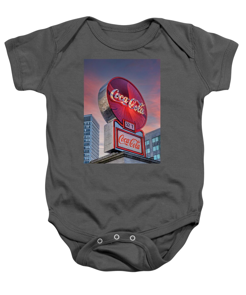 Atlanta Baby Onesie featuring the photograph Coca-Cola Sign in Atlanta at Dawn by Darryl Brooks