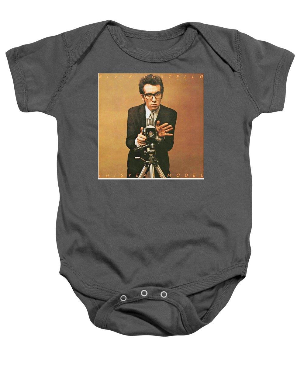  Elvis Costello Baby Onesie featuring the photograph COSTELLO This Years Model by Imagery-at- Work