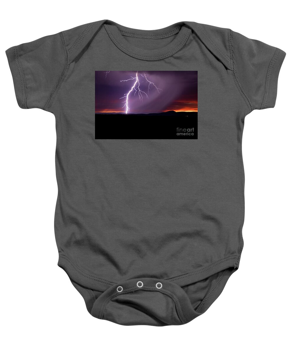 Taos Baby Onesie featuring the photograph Dancing With Lightning 7 by Elijah Rael