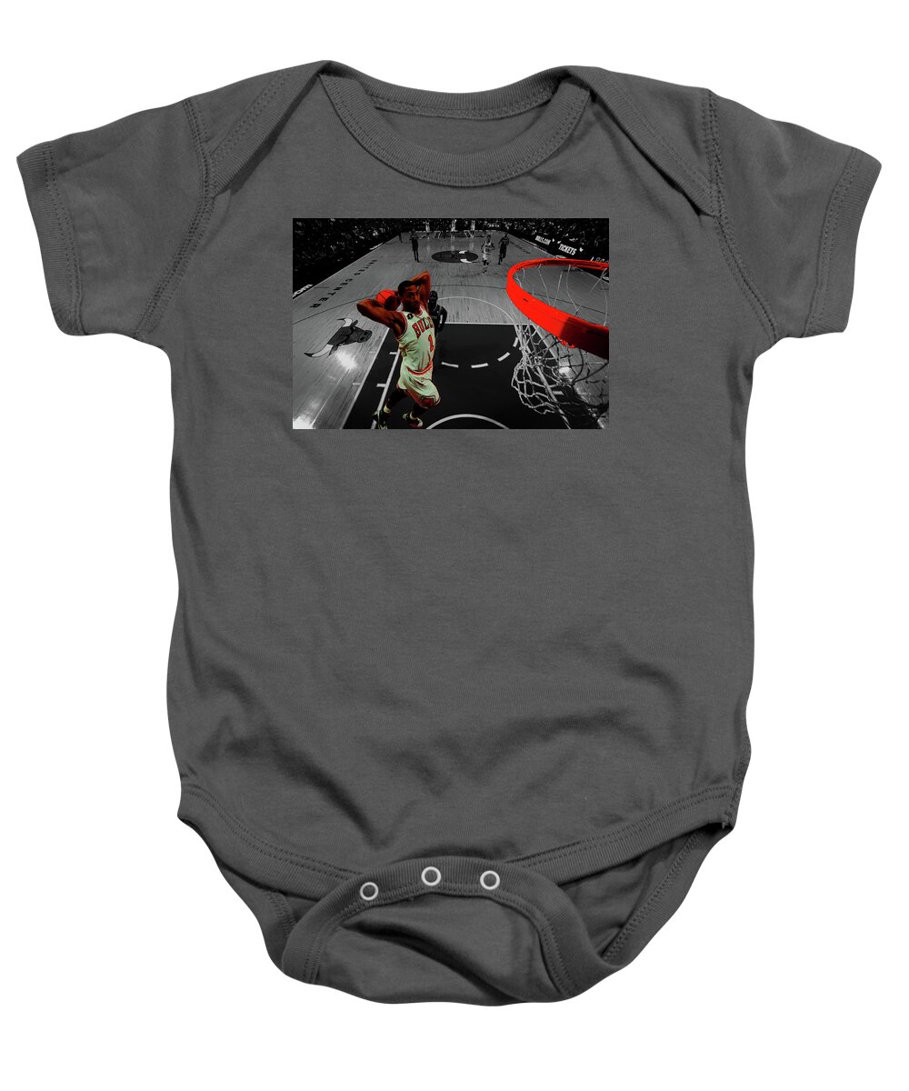 Derrick Rose Baby Onesie featuring the mixed media Derrick Rose Took Flight by Brian Reaves