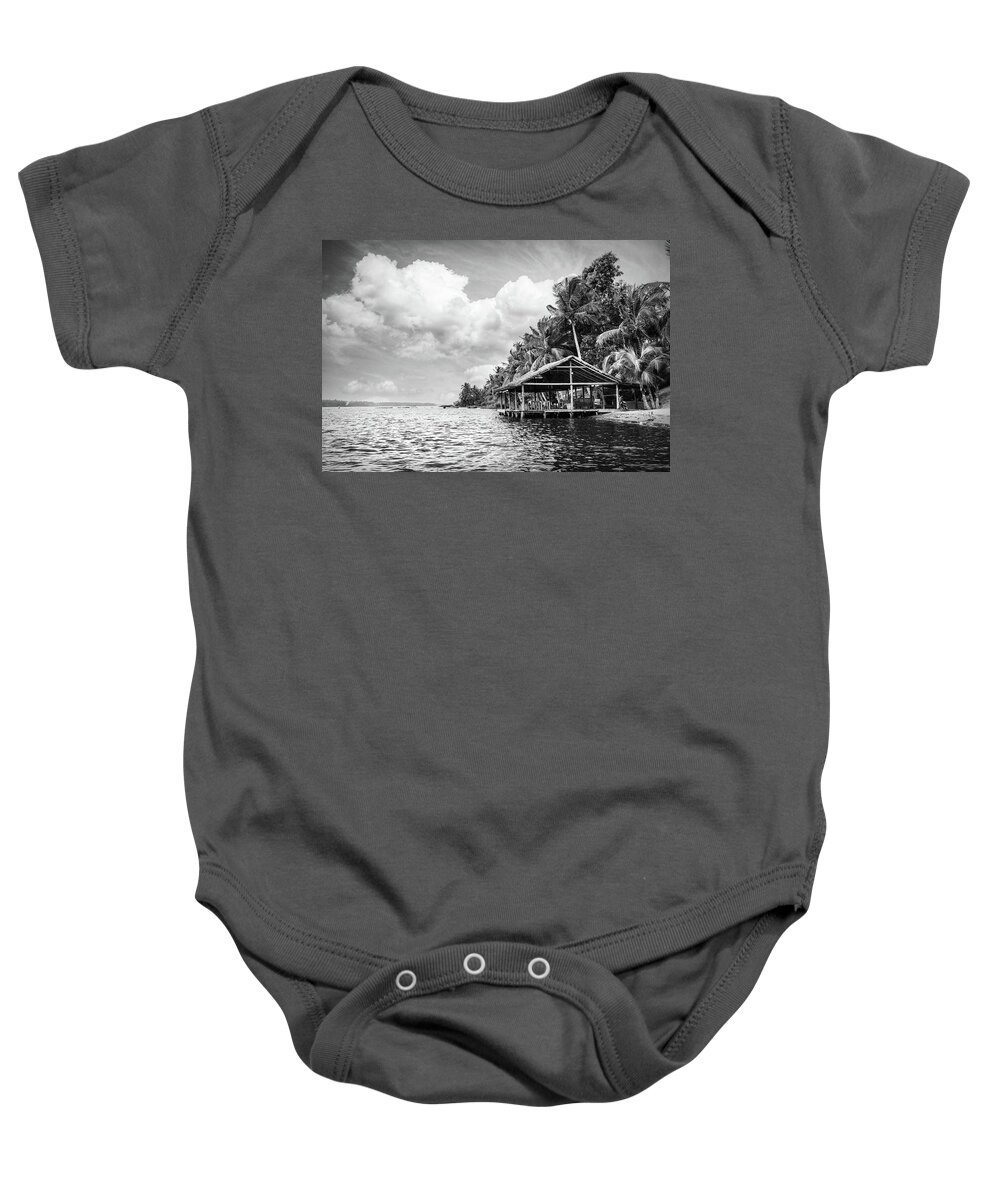 African Baby Onesie featuring the photograph Dockhouse Under the Palms Black and White by Debra and Dave Vanderlaan