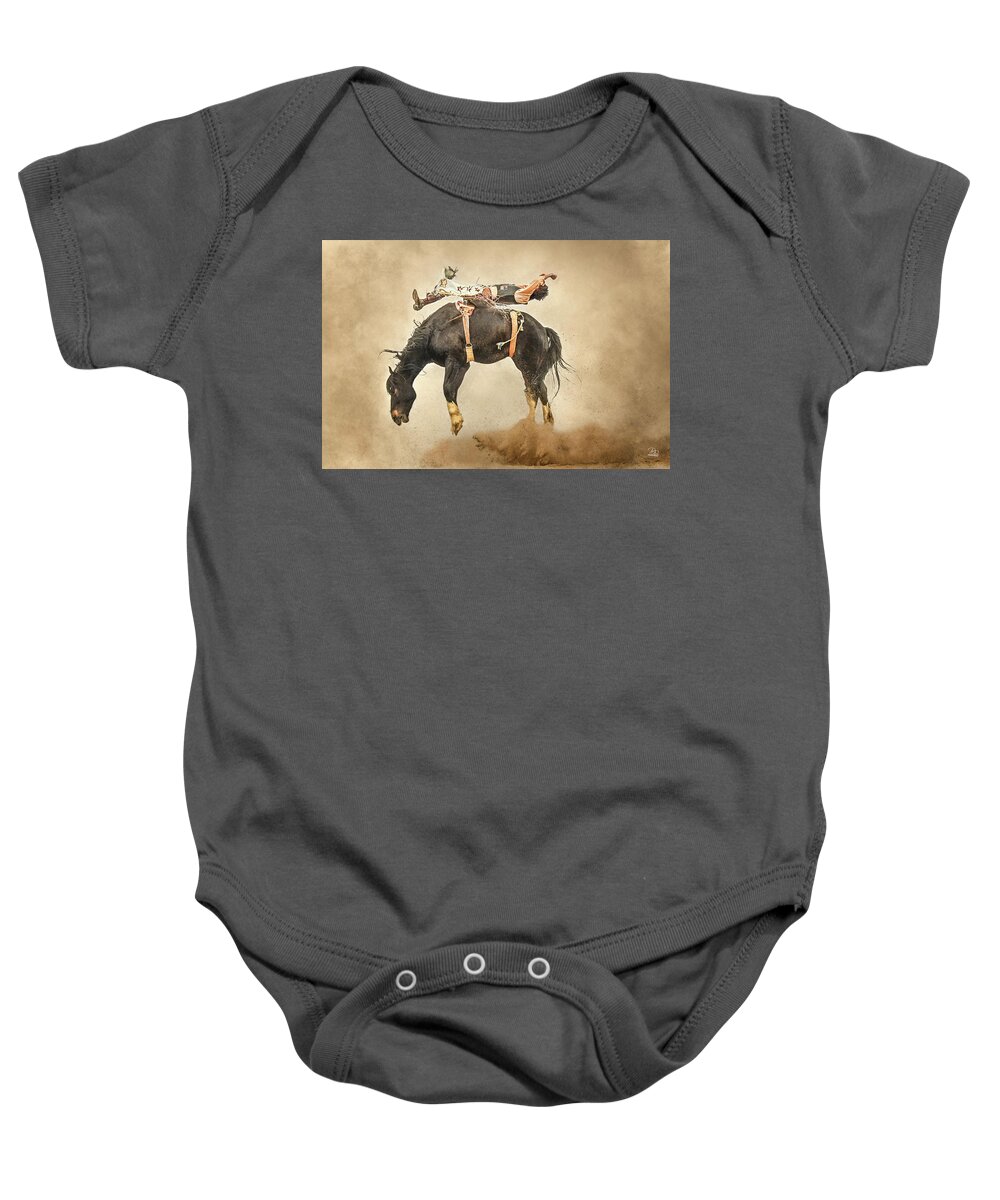 Bronc Baby Onesie featuring the photograph Flat Out by Debra Boucher