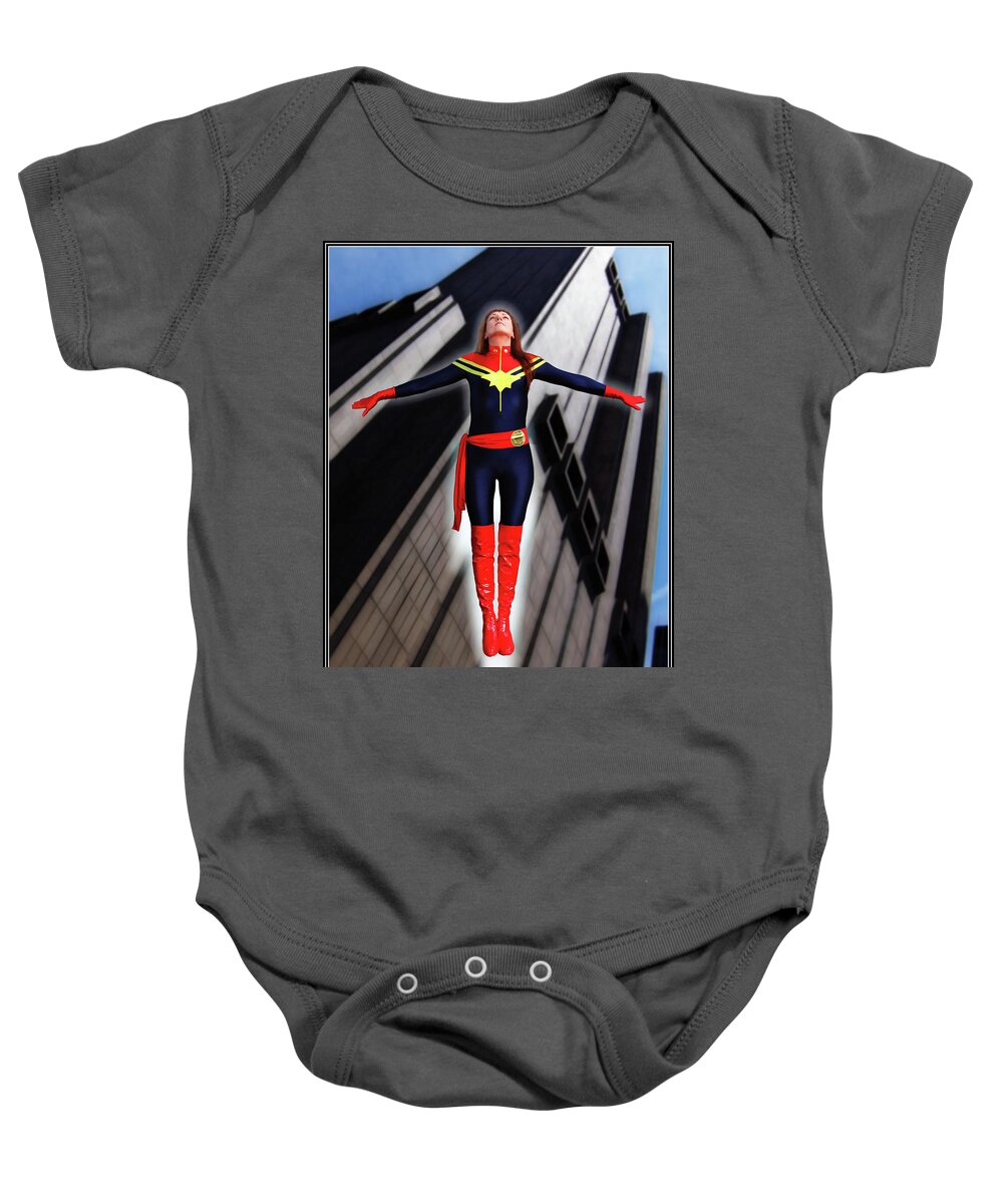 Captain Baby Onesie featuring the photograph Going Up by Jon Volden