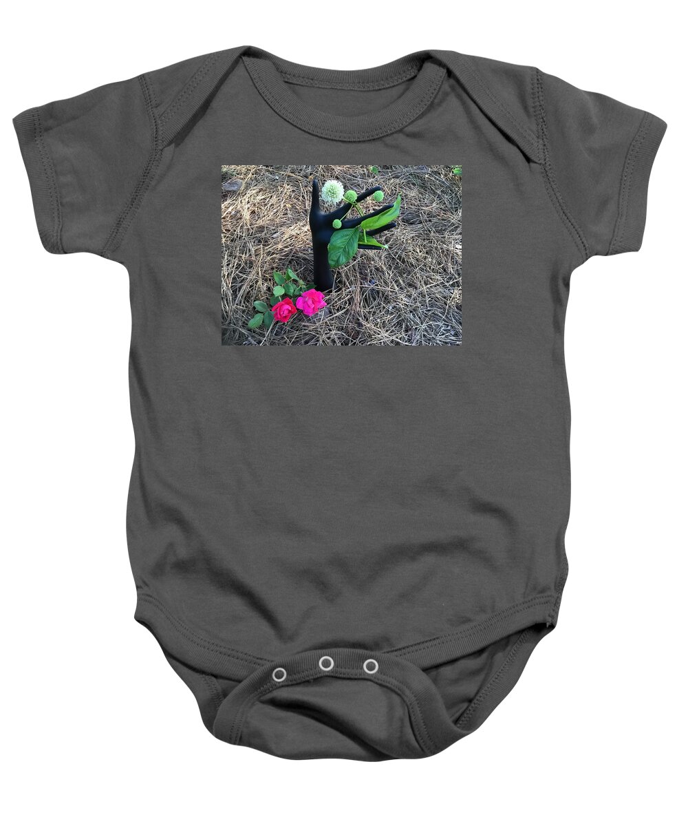 Hand Flowers Baby Onesie featuring the photograph Hand Flowers 1 by Catherine Wilson
