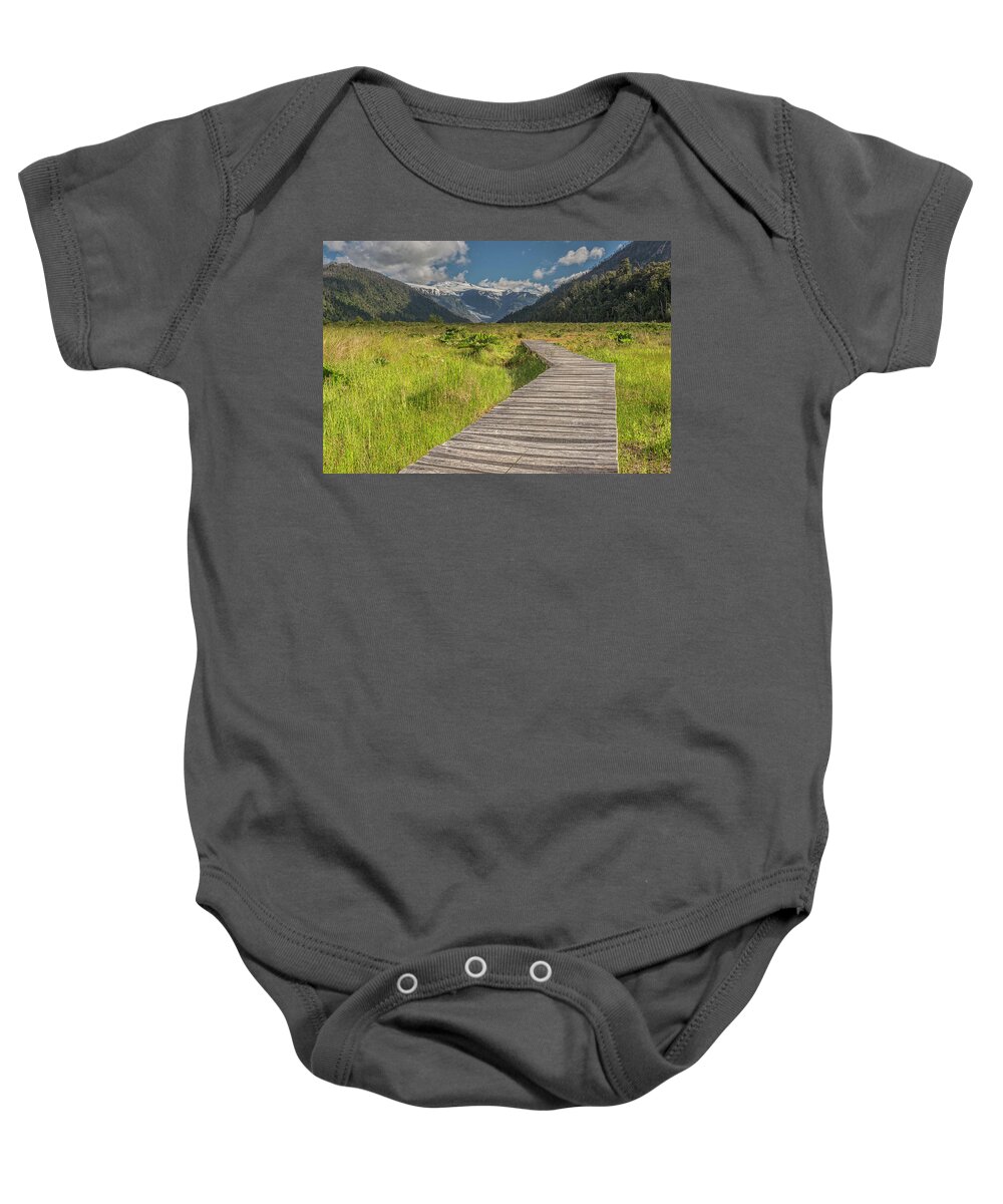 Chile Baby Onesie featuring the photograph Hiking path to the Michinmahuida glacier by Henri Leduc