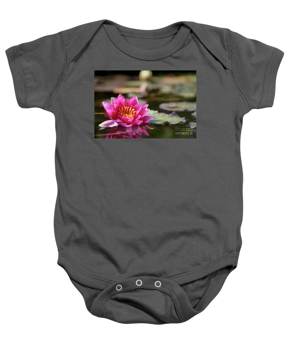 Lotus Flower Baby Onesie featuring the photograph Lotus Flower in Pond by Catherine Walters