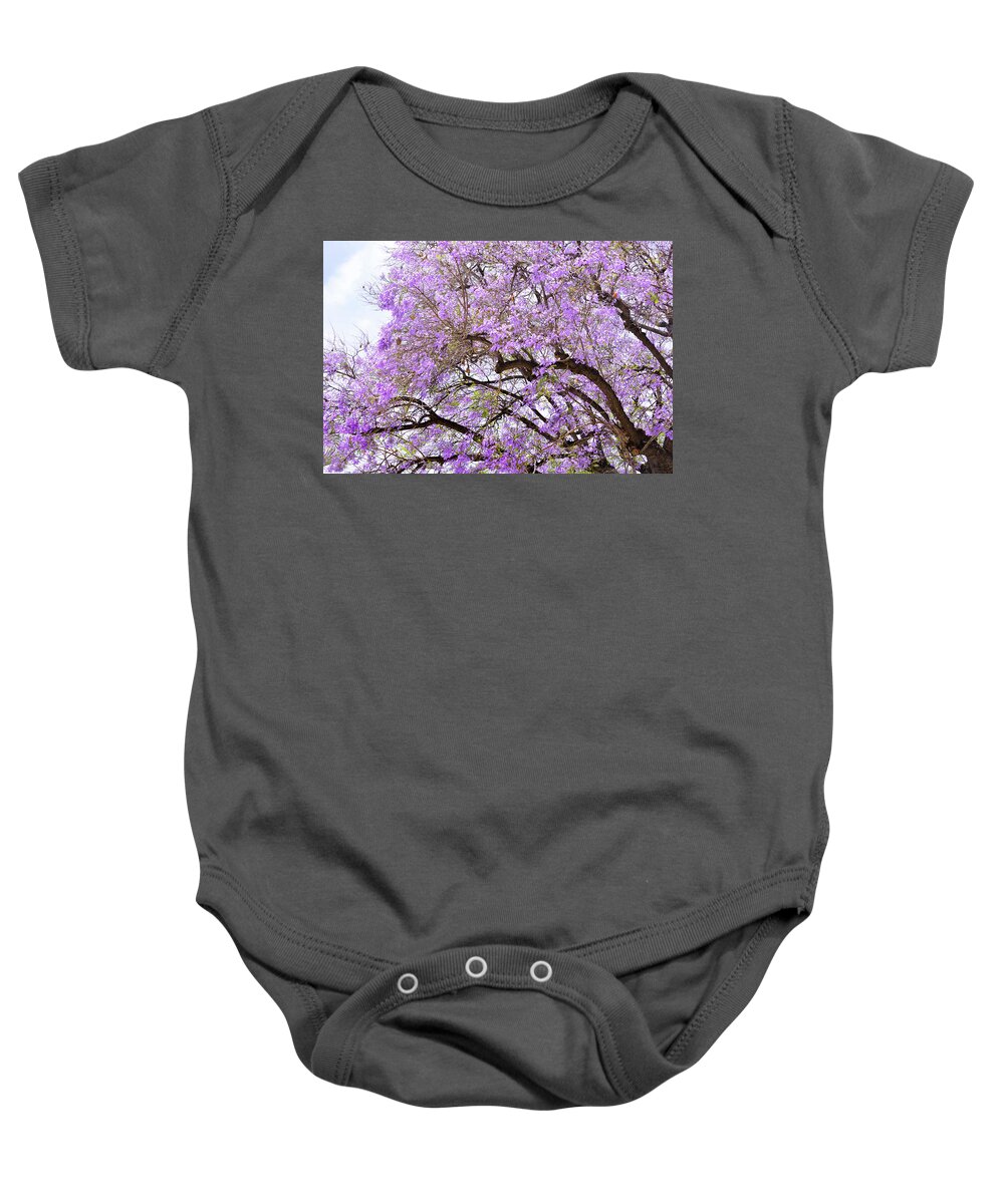 Jacaranda Baby Onesie featuring the photograph Magnificent Floral Branches of Jacaranda Trees by Brian Tada