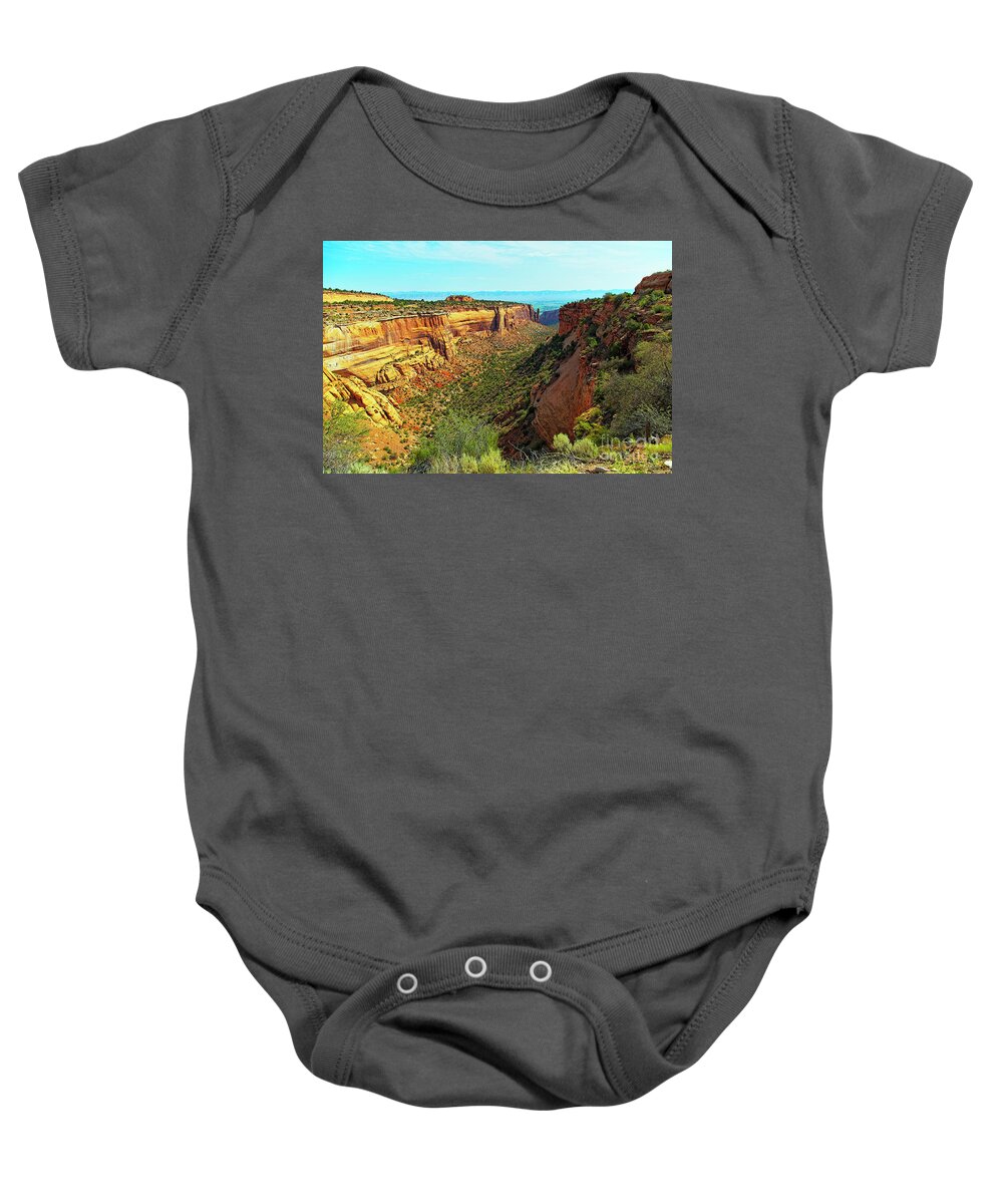 Jon Burch Baby Onesie featuring the photograph Monument Canyon and Saddlehorn by Jon Burch Photography