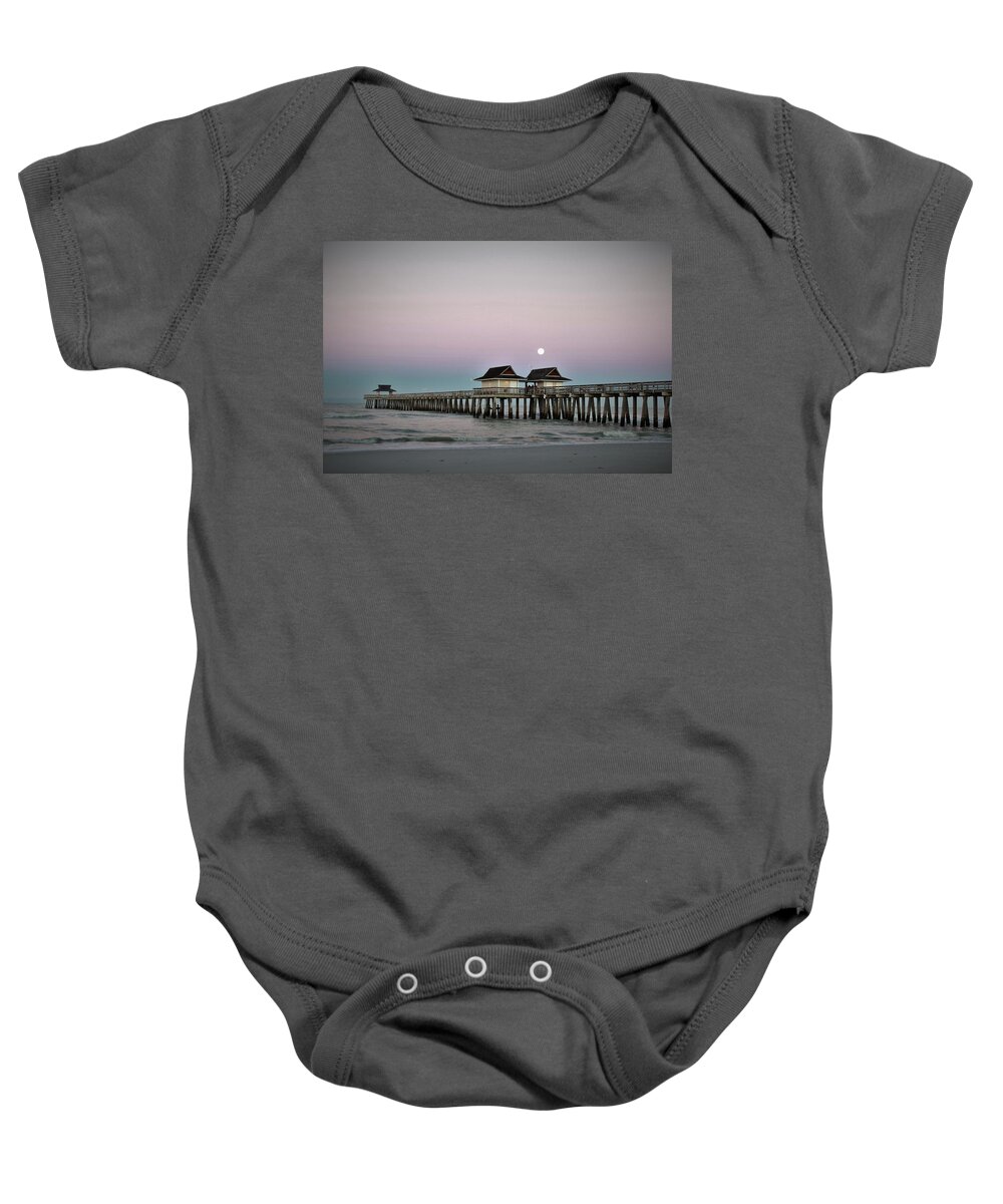  Baby Onesie featuring the photograph Naples Pier Moonset by Donn Ingemie