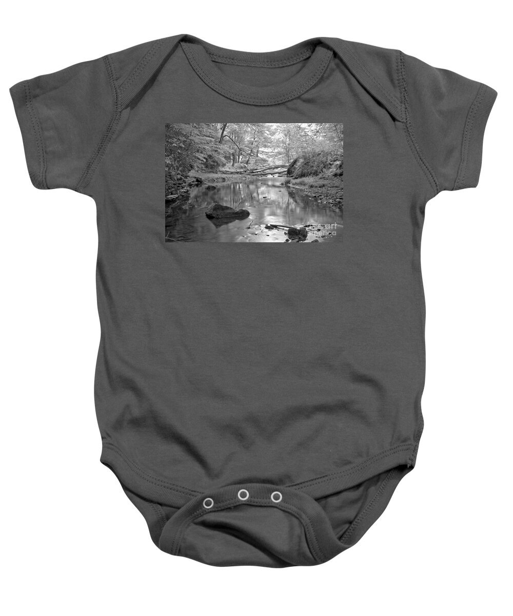 Toms Baby Onesie featuring the photograph Perfect Reflections In Toms Run Black And White by Adam Jewell