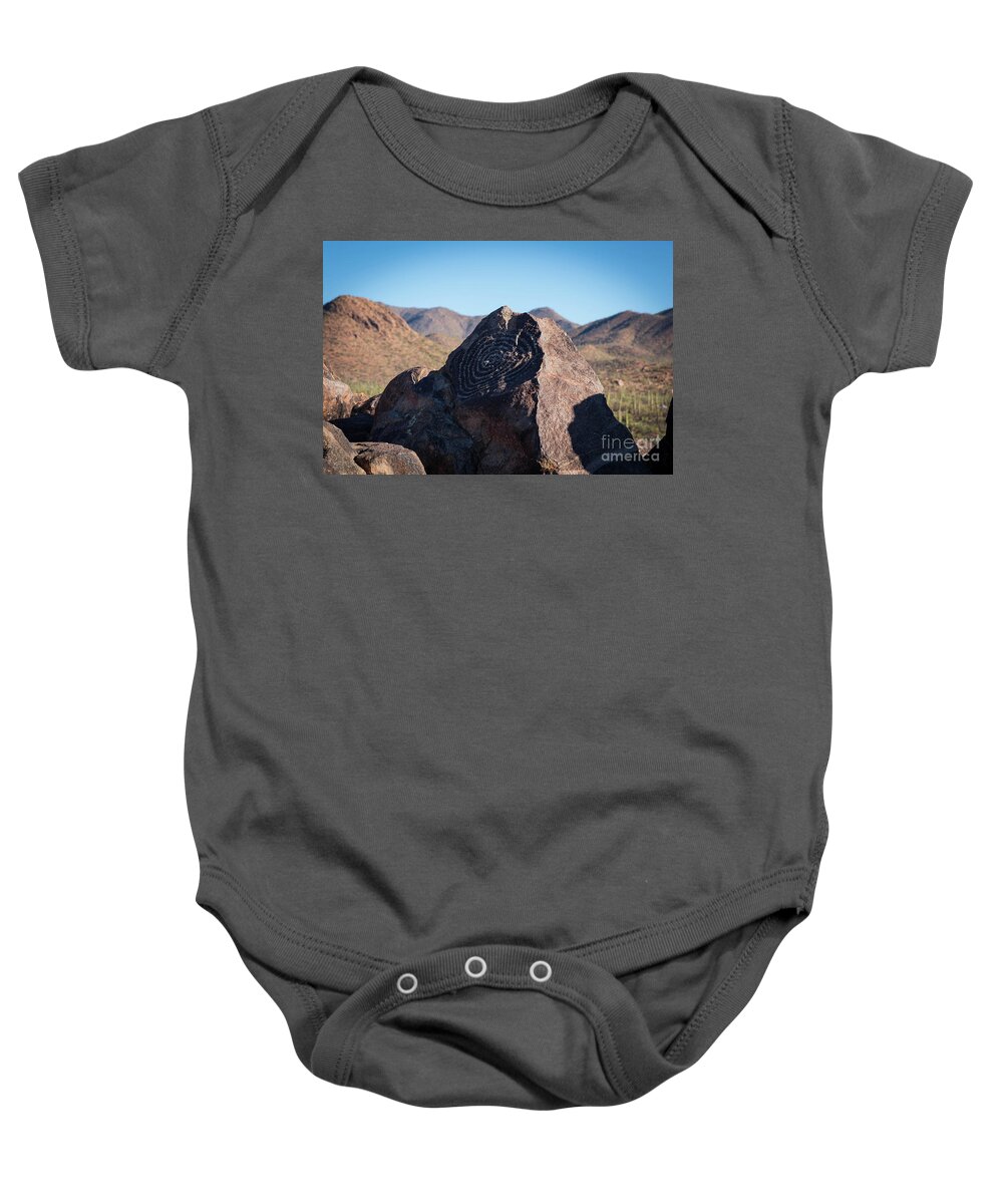 Petroglyph Baby Onesie featuring the photograph Petroglyph. Signal Hill Trail. by Jeff Hubbard