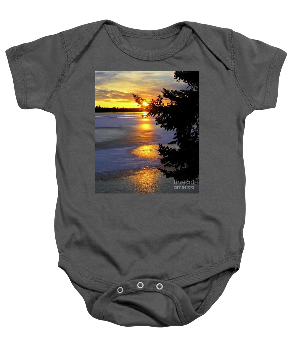 Inspirational Sunset Baby Onesie featuring the photograph Golden Sunset Across The Lake by Ann Brown