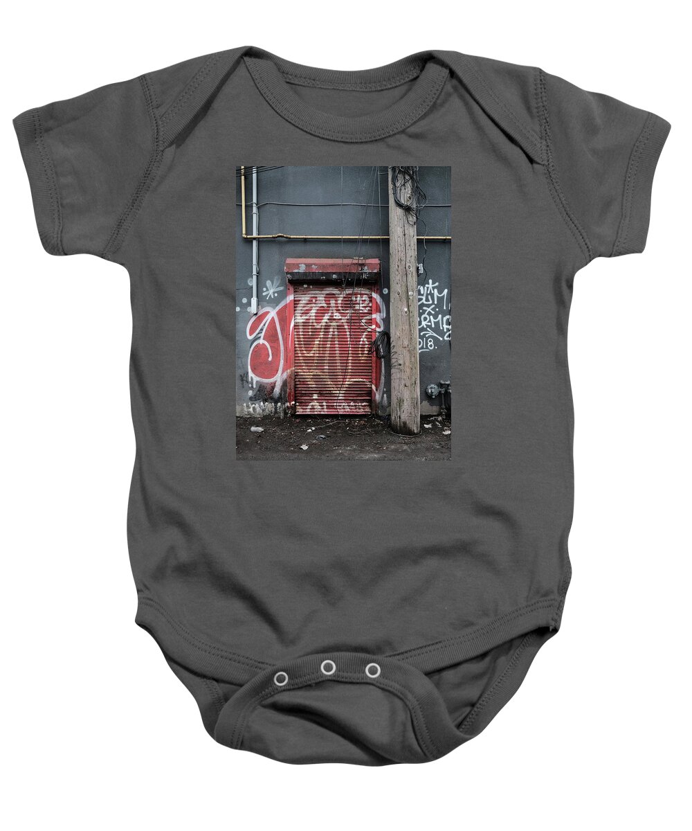 Urban Baby Onesie featuring the photograph Steel Door by Kreddible Trout