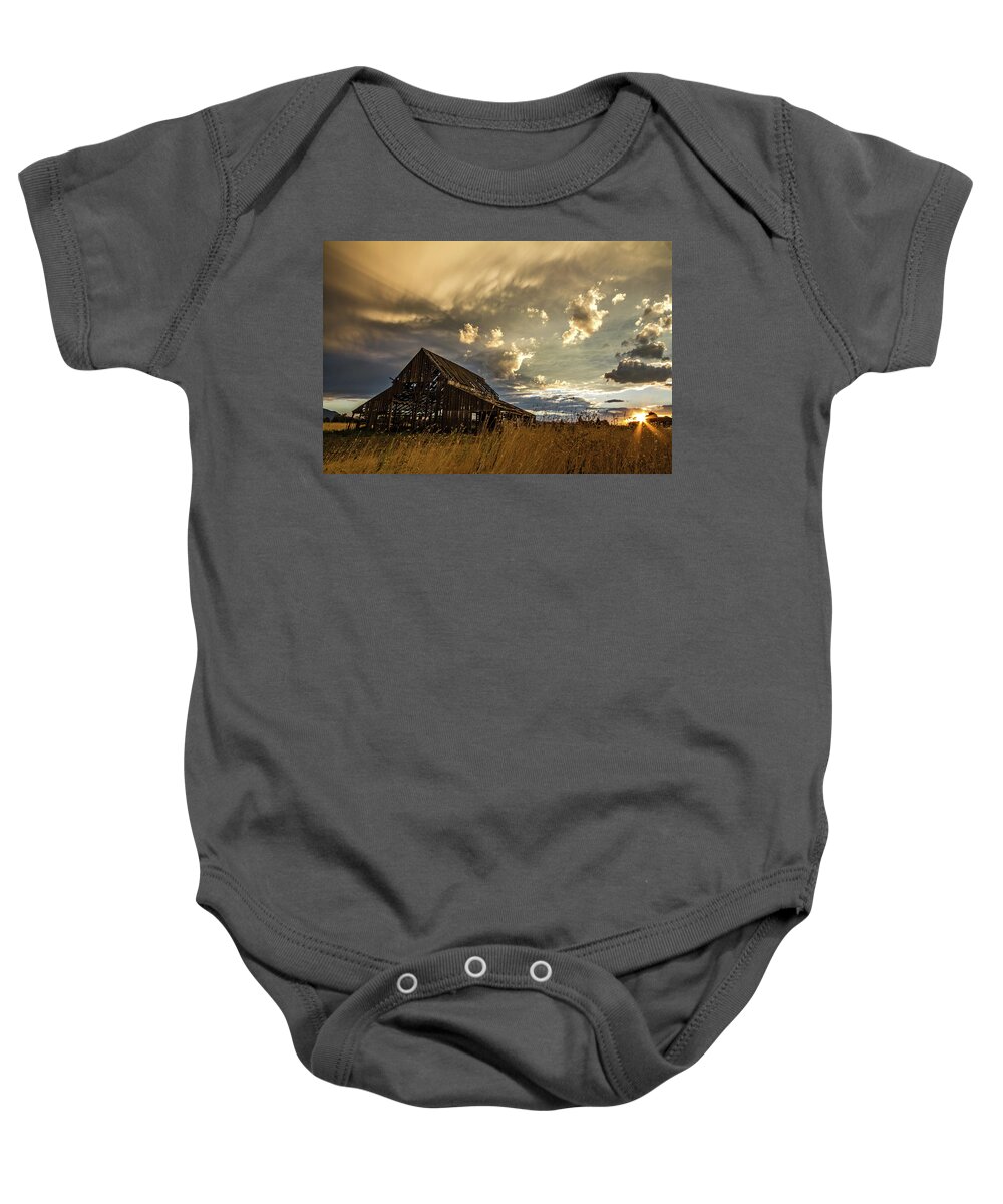 Barn Baby Onesie featuring the photograph Sunset Flare at Mapleton Barn by Wesley Aston