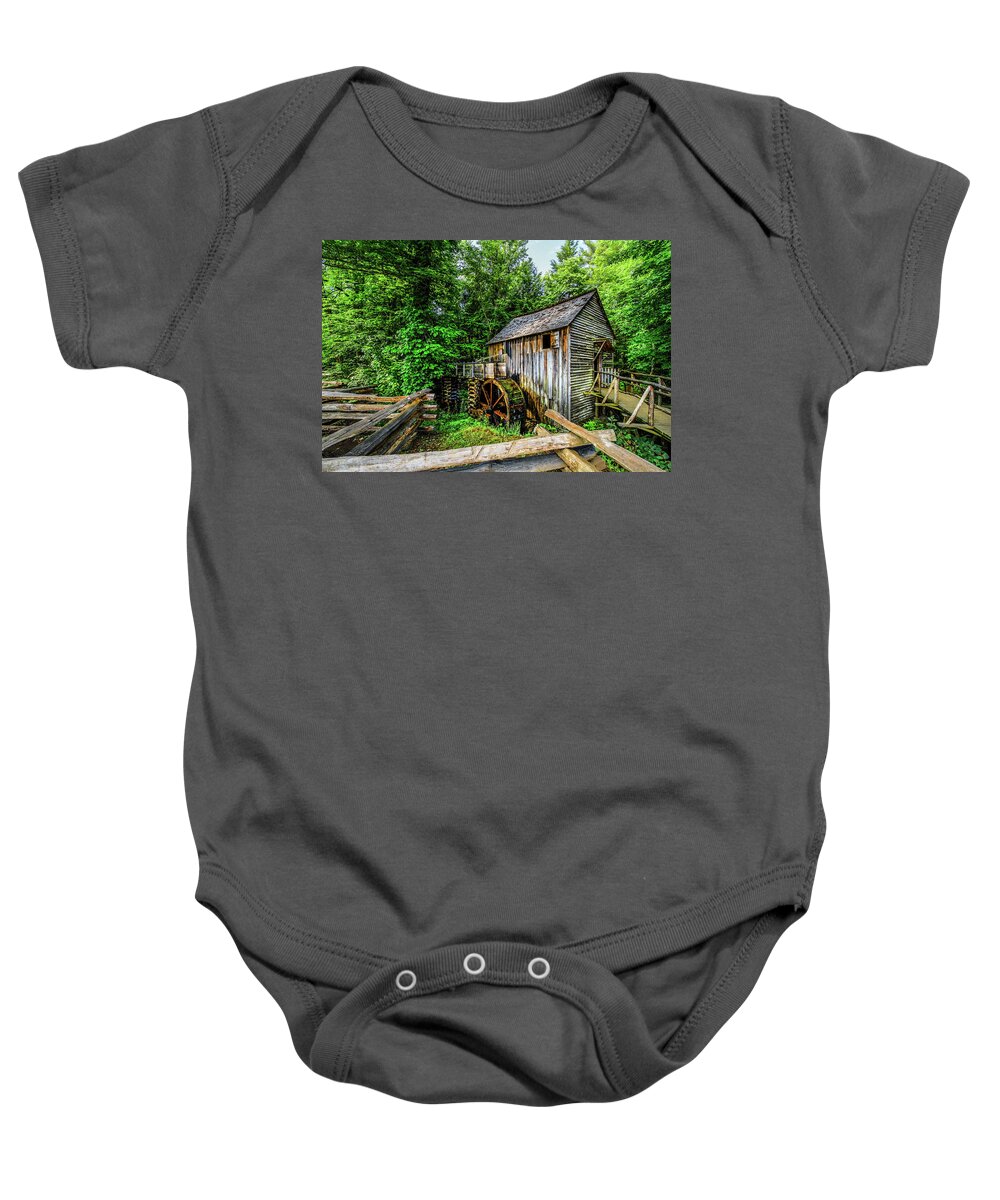 Barns Baby Onesie featuring the photograph The Mill and Fences at Cades Cove Townsend Tennessee by Debra and Dave Vanderlaan