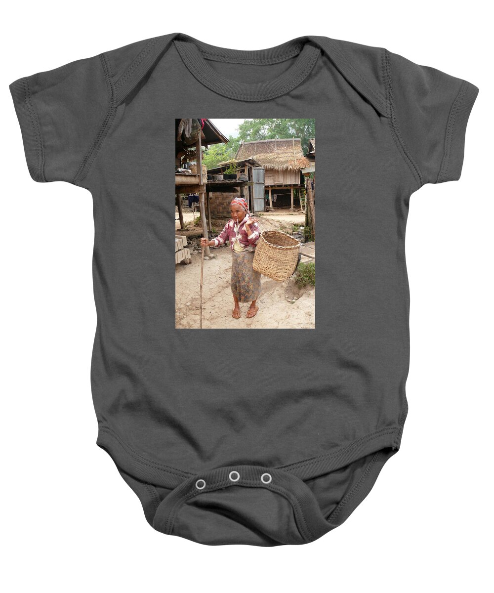 Tribal Woman Baby Onesie featuring the photograph Tribal woman with the basket by Robert Bociaga