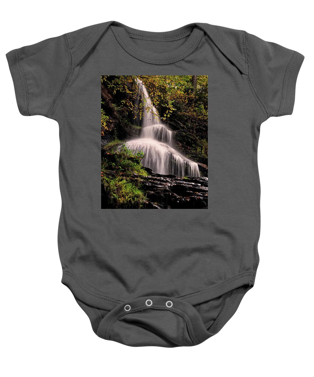 Waterfall Baby Onesie featuring the photograph upper portion of Cathedral Falls by Flees Photos
