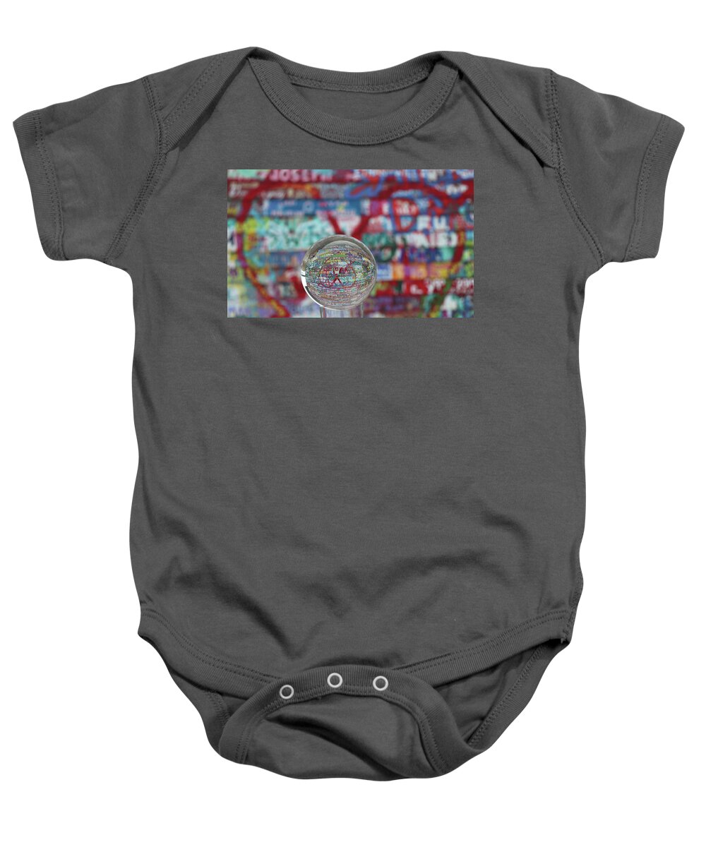 Anderson Dock Baby Onesie featuring the photograph Valentine Graffiti Lensball by David T Wilkinson
