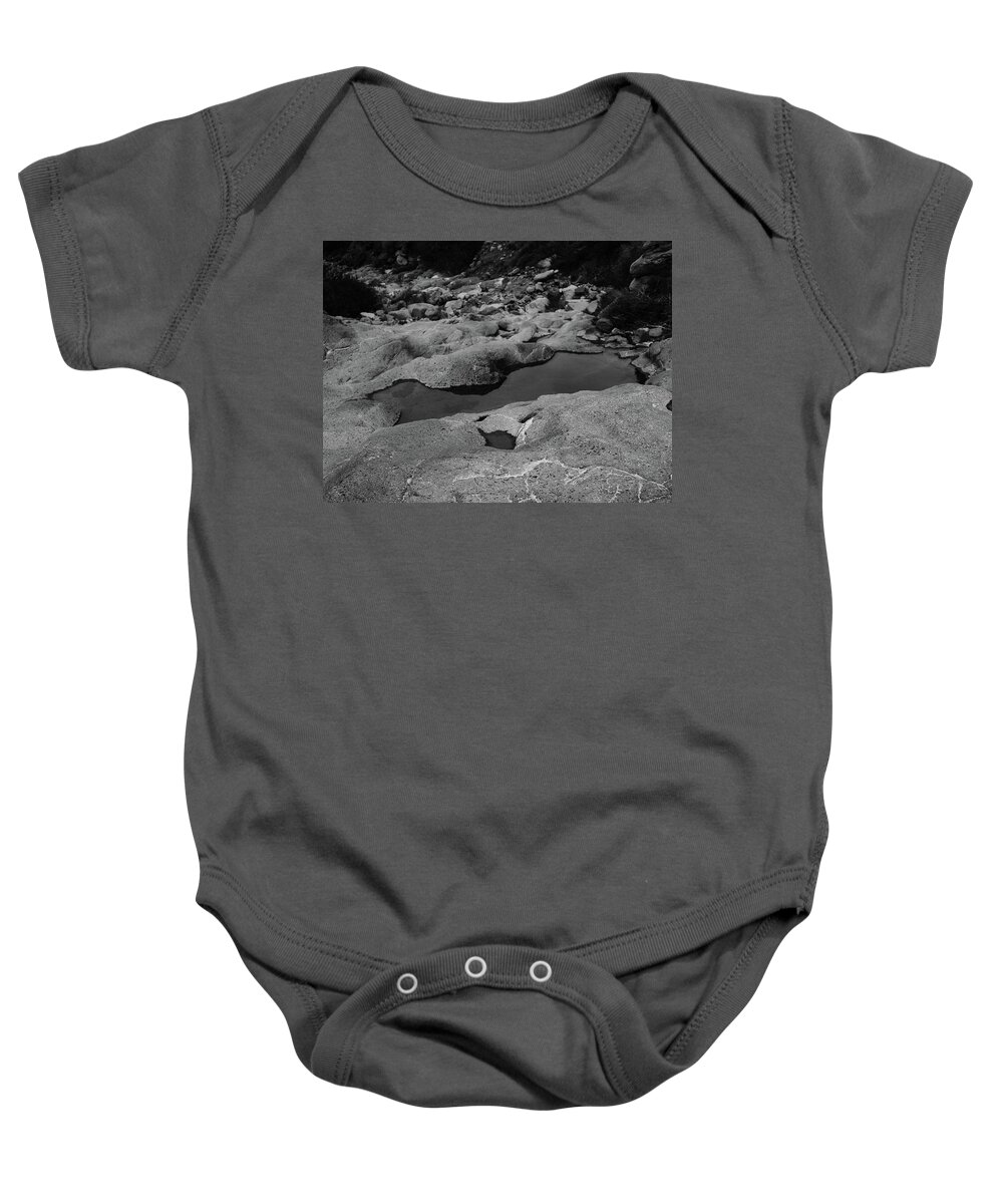 Black And White Baby Onesie featuring the photograph Water In Wash by John Vail