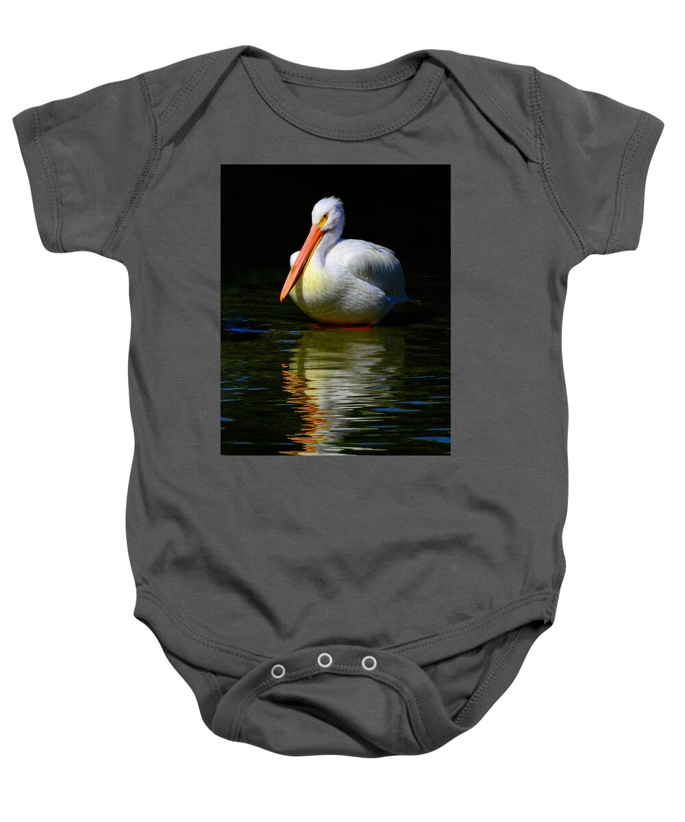 Pelican Baby Onesie featuring the photograph White Pelican of the Night by Alison Belsan Horton