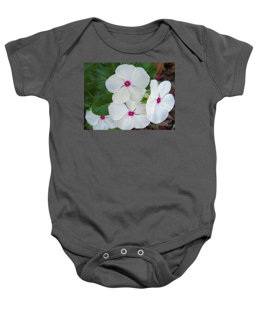 Periwinkle Baby Onesie featuring the photograph White Periwinkles by D Hackett