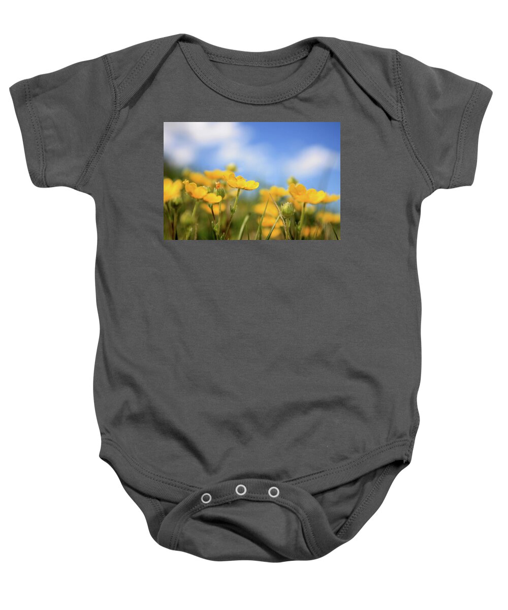 Summer Baby Onesie featuring the photograph Yellow and blue by Maria Dimitrova
