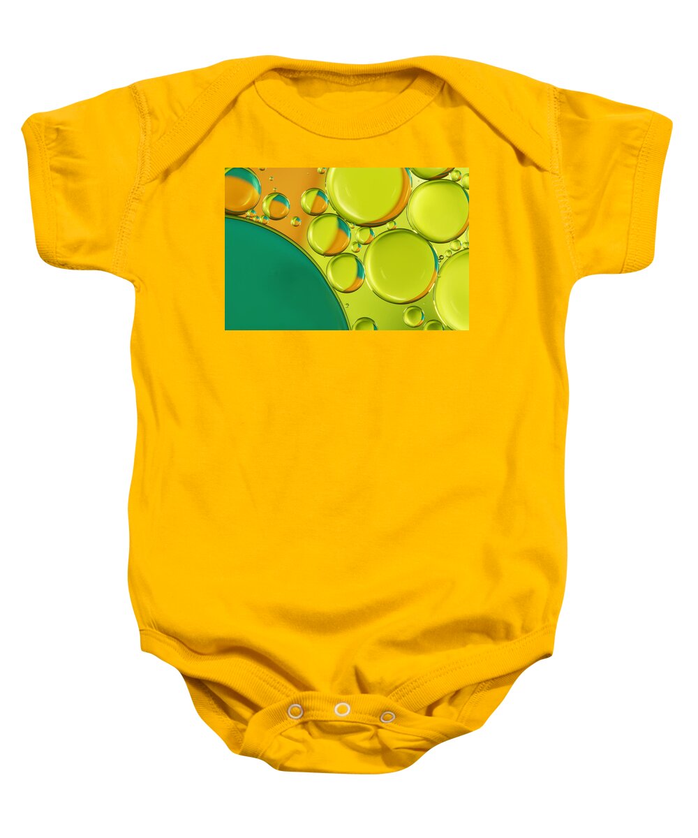 Oil Baby Onesie featuring the photograph Bubble Abstract with a Twist of Lime by Sharon Johnstone