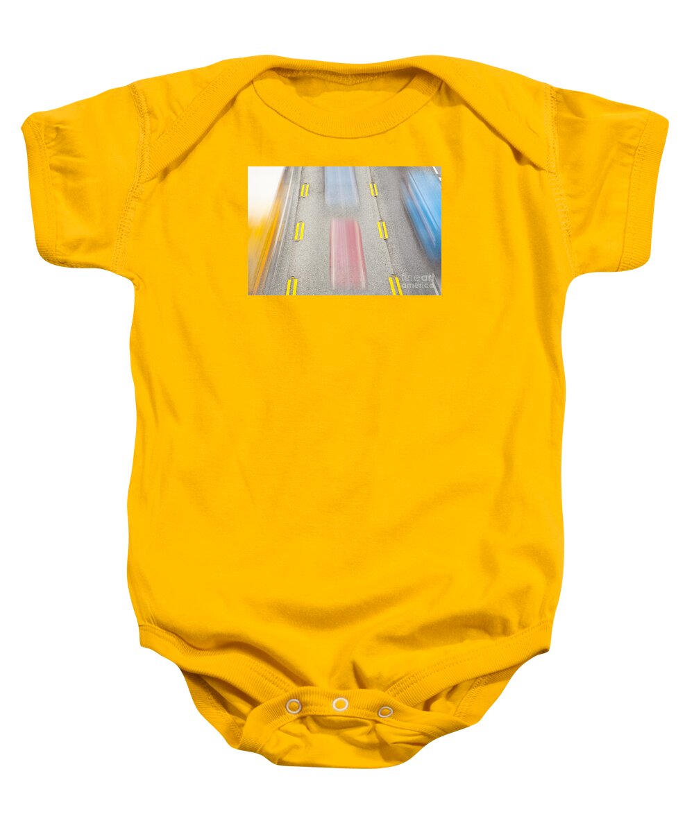 Automobile Baby Onesie featuring the photograph Cars Speeding Along Highway by Bryan Mullennix