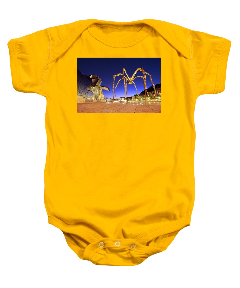 Guggenheim Baby Onesie featuring the photograph Guggenheim museum and spider at night in Bilbao by Mikel Martinez de Osaba