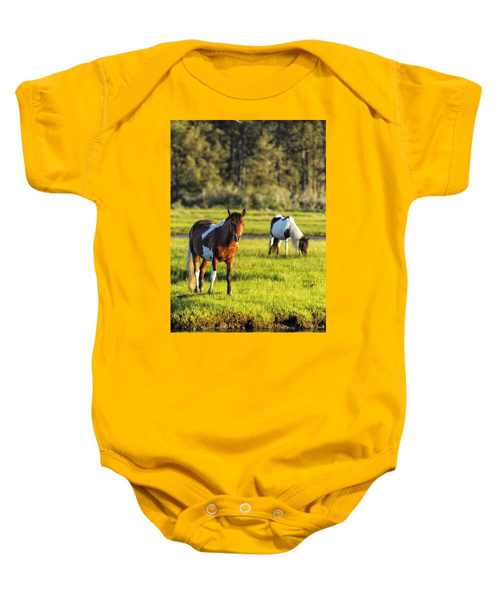 Horse Baby Onesie featuring the photograph Leaving the Chincoteague Ponies by Belinda Greb