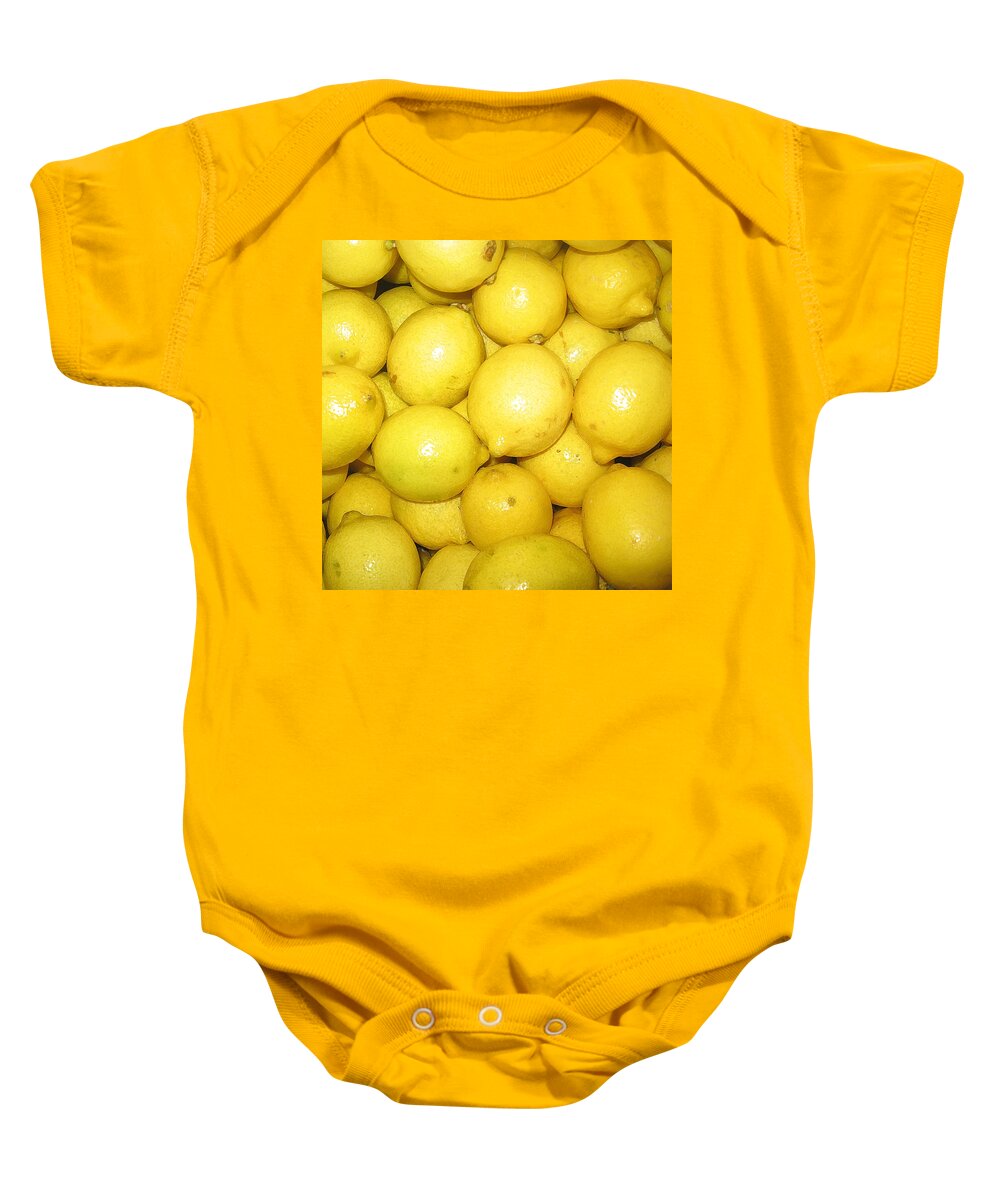 Fruit Baby Onesie featuring the photograph Lemon by John Vincent Palozzi