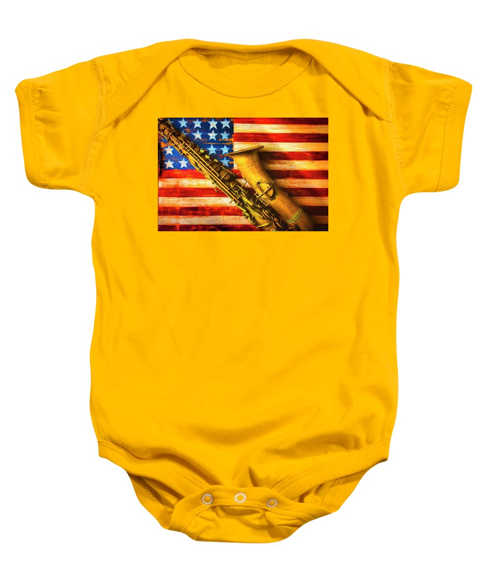 American Baby Onesie featuring the photograph Old Saxophone On Wooden Flag by Garry Gay