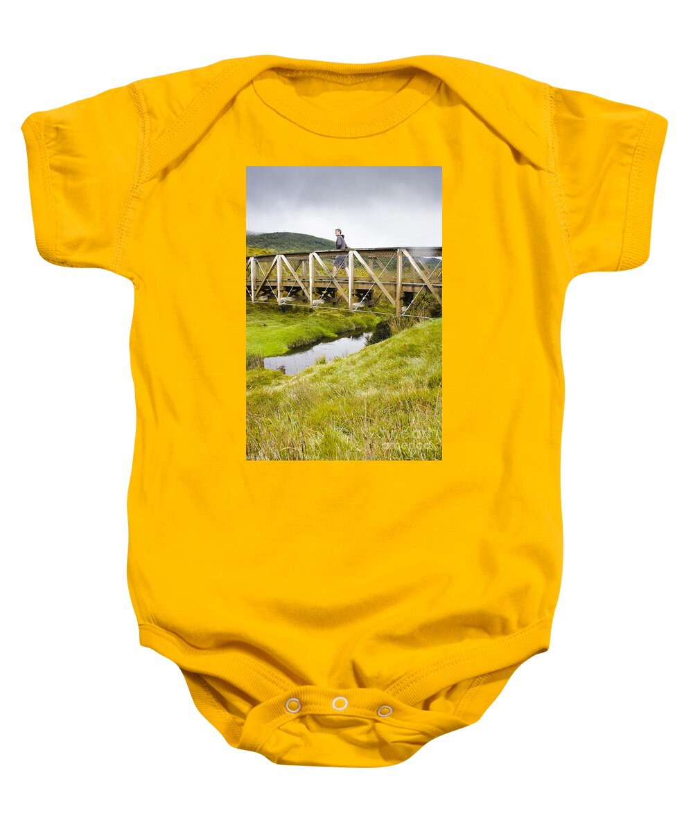 Australia Baby Onesie featuring the photograph Young man on outback bush sightseeing tour by Jorgo Photography