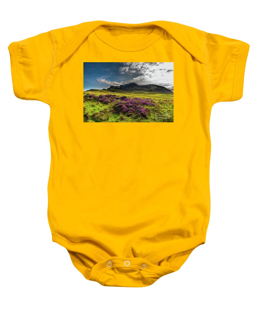 Abandoned Baby Onesie featuring the photograph Pasture With Blooming Heather In Scenic Mountain Landscape At The Old Man Of Storr Formation On The by Andreas Berthold