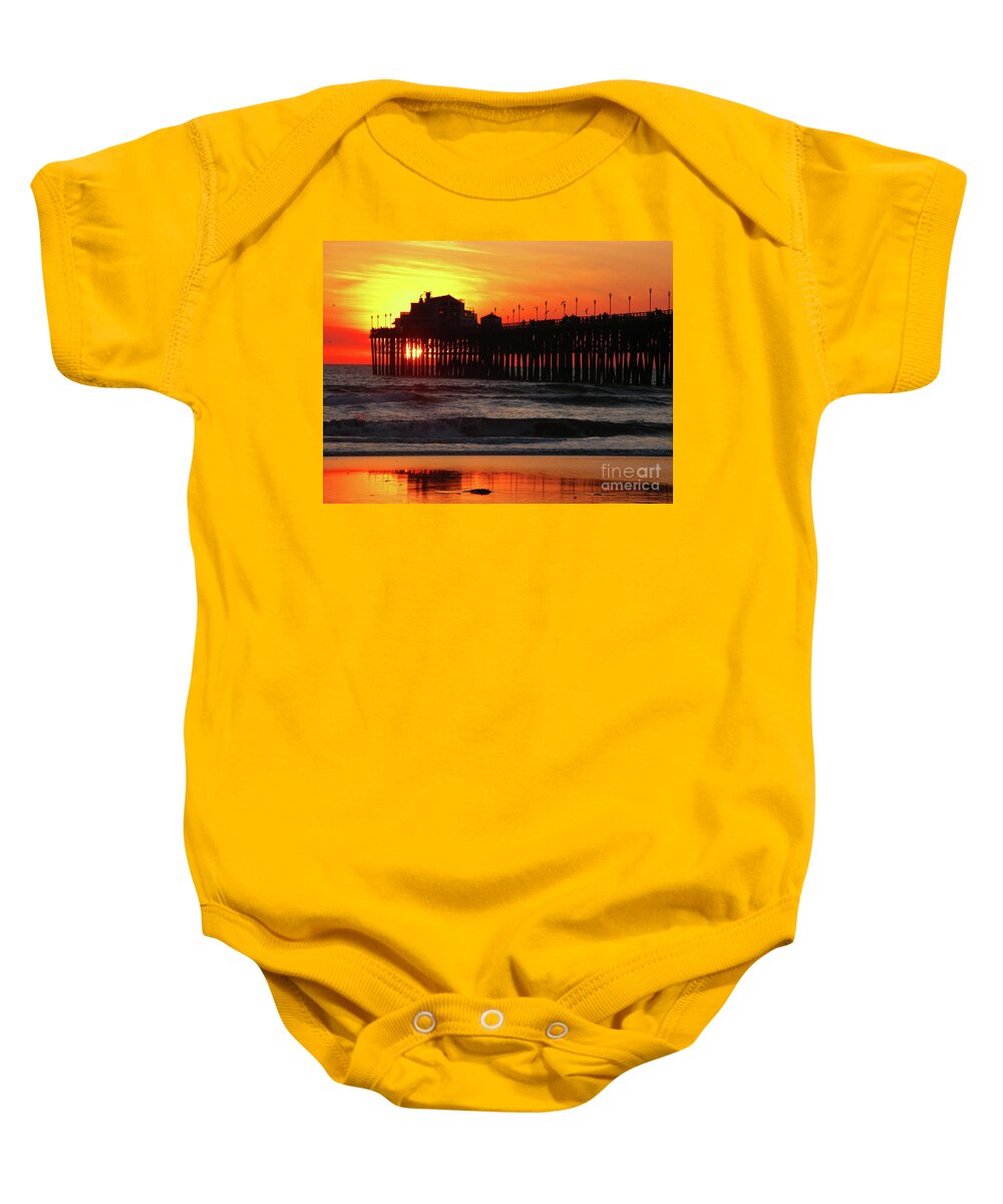 Pacific Ocean Baby Onesie featuring the photograph Pier at Sunset by Terri Brewster