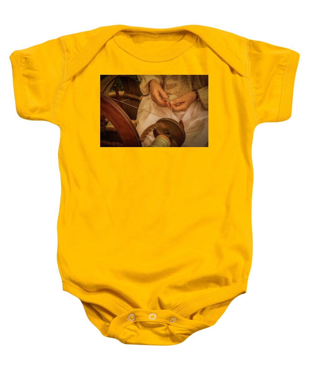 Fingers Baby Onesie featuring the photograph Spinner by Guy Whiteley
