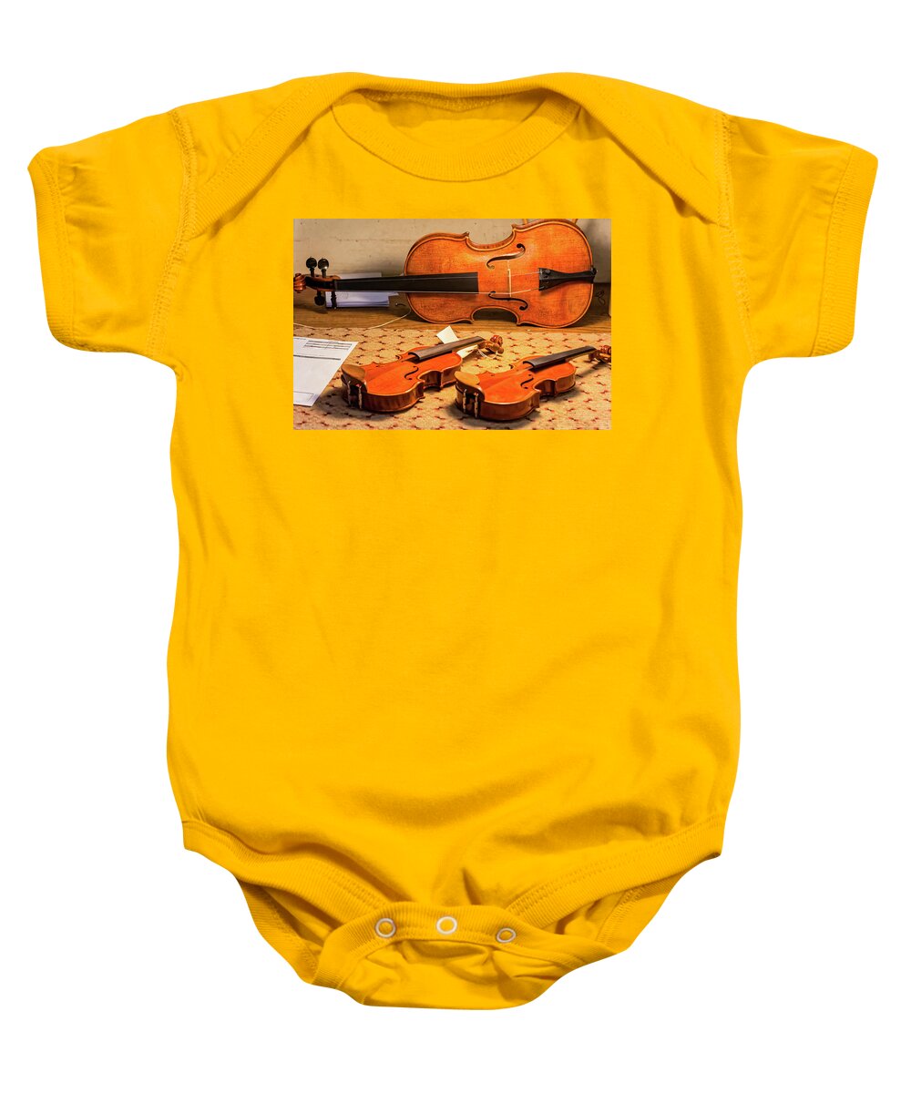  Baby Onesie featuring the photograph Master to Apprentices by Charles McCleanon