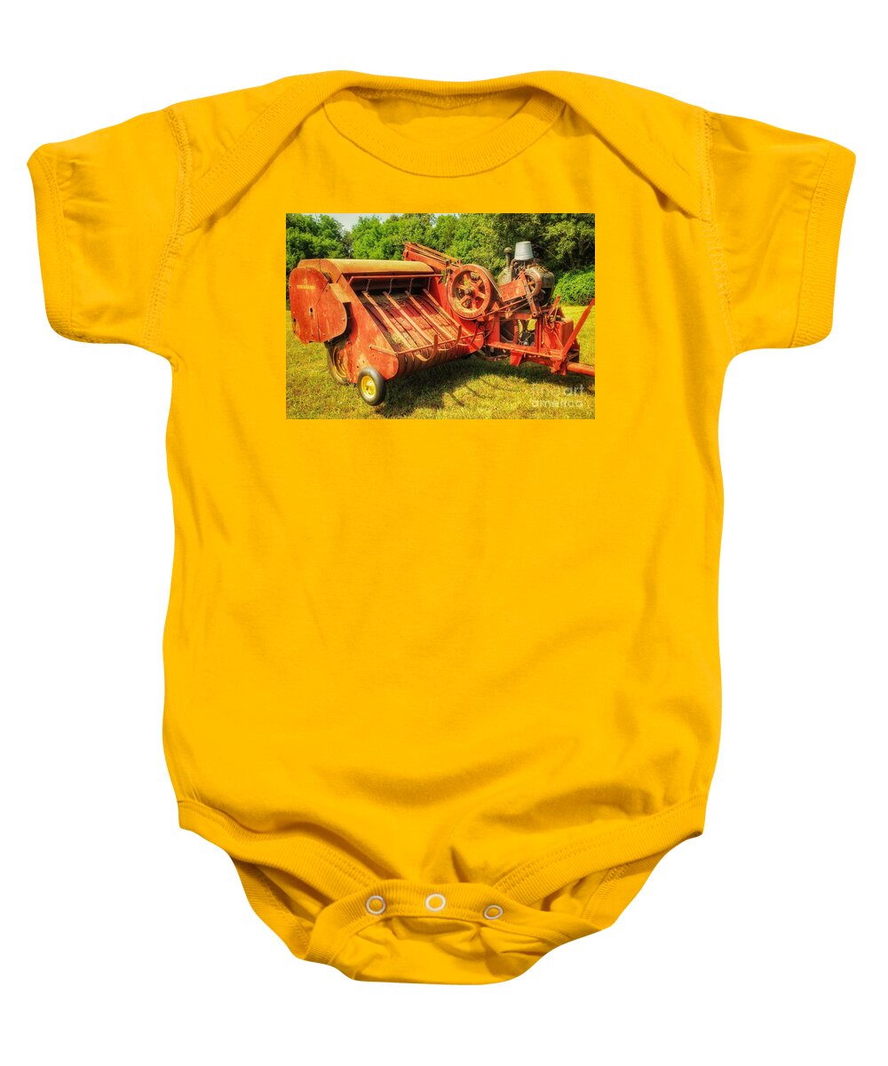 New Holland Baby Onesie featuring the photograph New Holland Baler by Mike Eingle