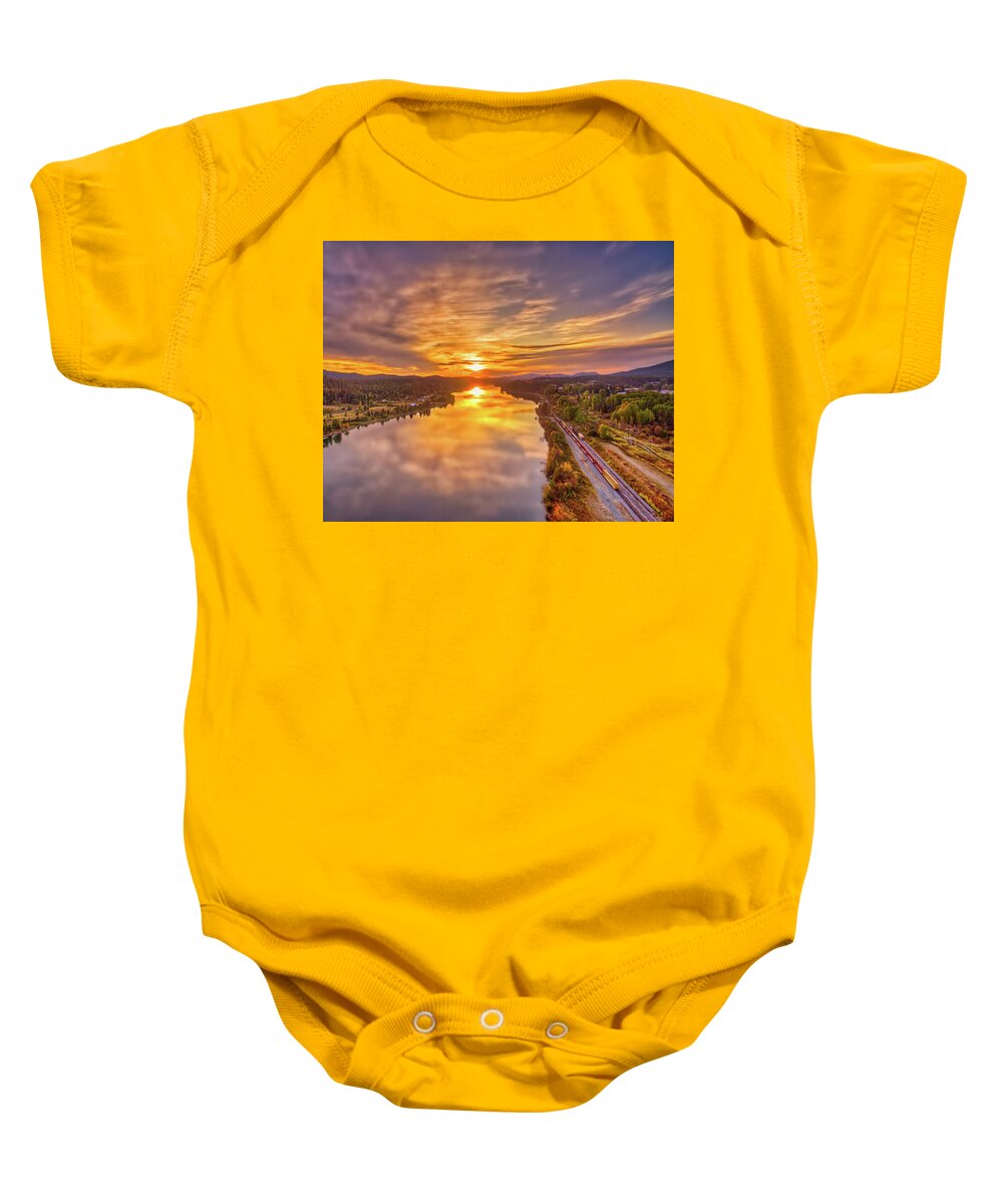 Pend Oreille Baby Onesie featuring the photograph Pend Oreille River Sunset by Dan Eskelson