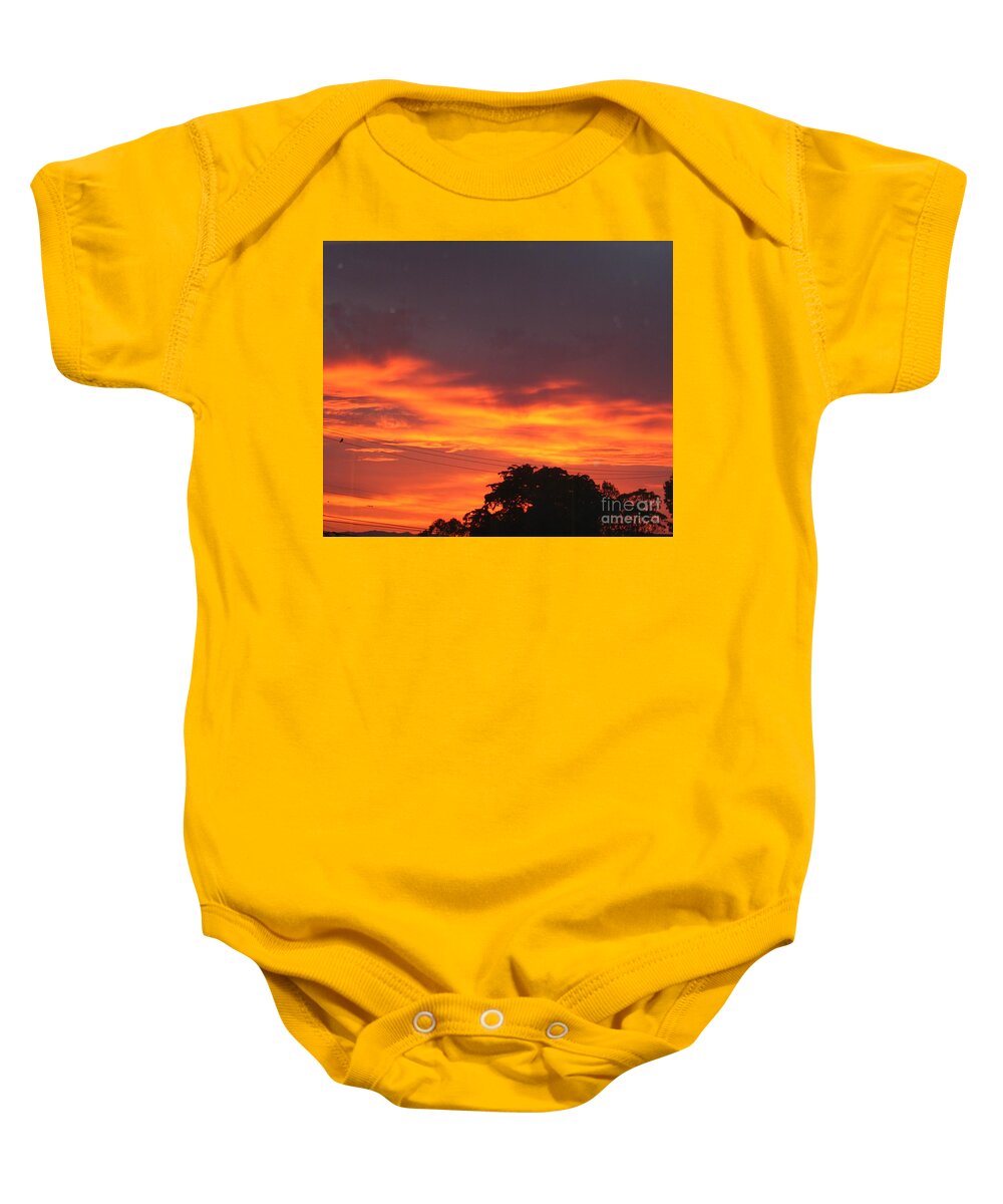 Sunrise Baby Onesie featuring the photograph Sunrise to a stormy day by Cynthia Marcopulos