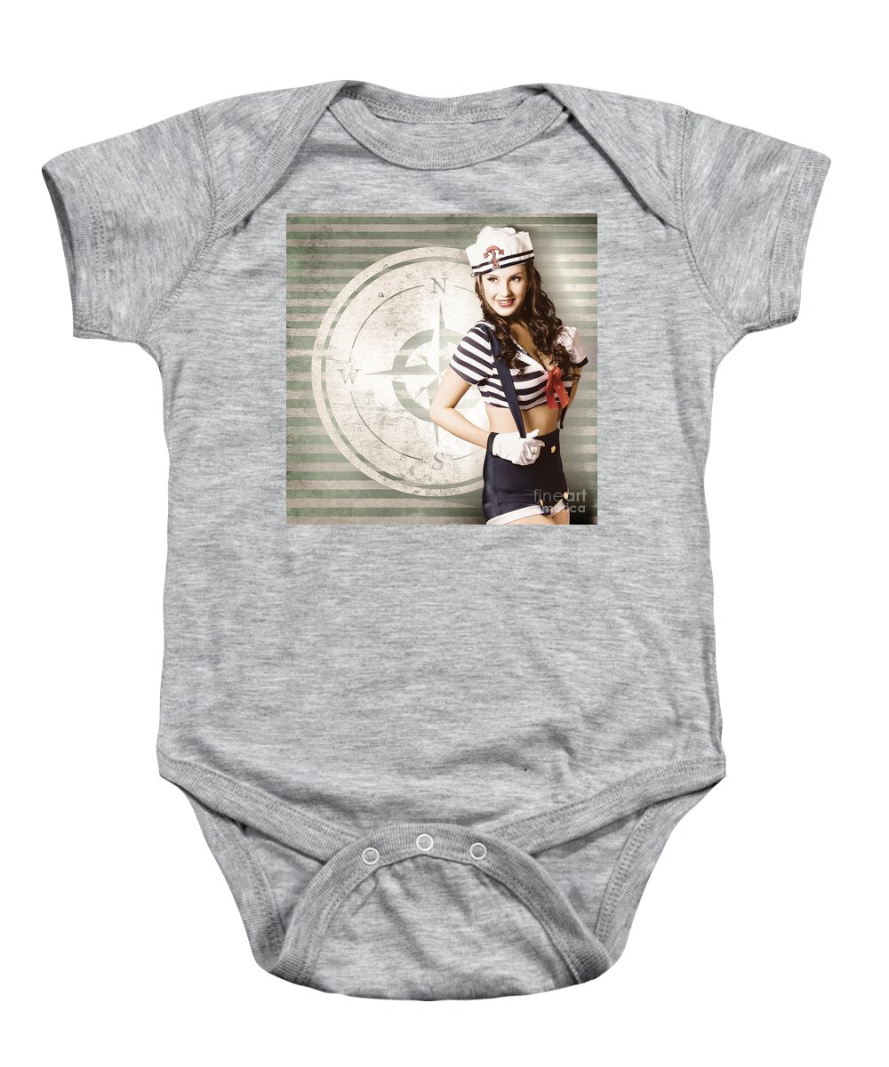 Yachting Baby Onesie featuring the photograph Young sailor pin up girl on travel cruise compass #1 by Jorgo Photography