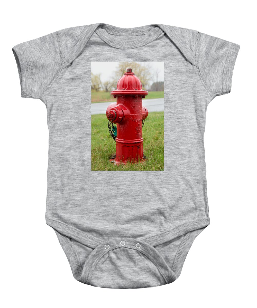 Fire Baby Onesie featuring the photograph A Fire Hydrant by Courtney Webster