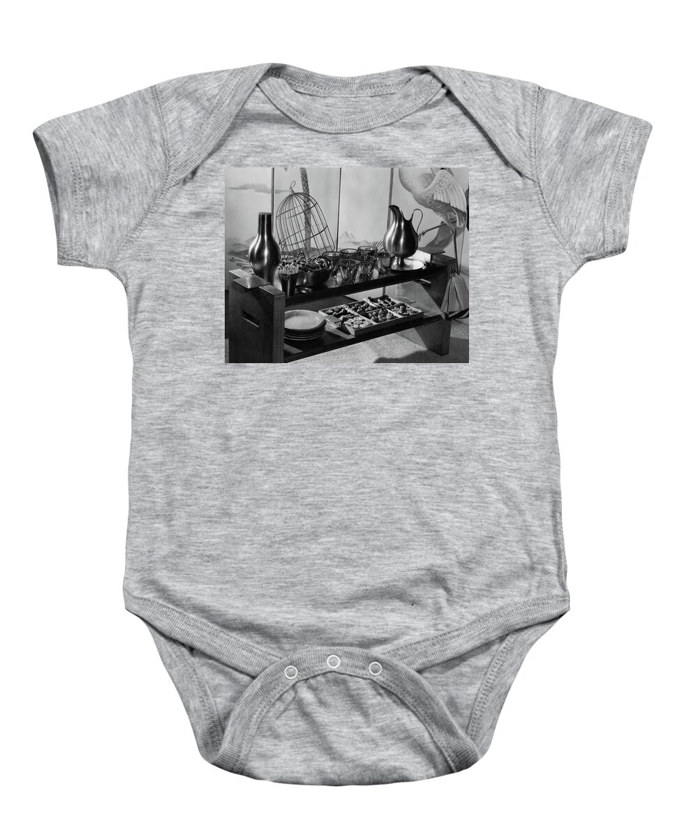 Interior Baby Onesie featuring the photograph A Table With Tableware And Snacks by The 3