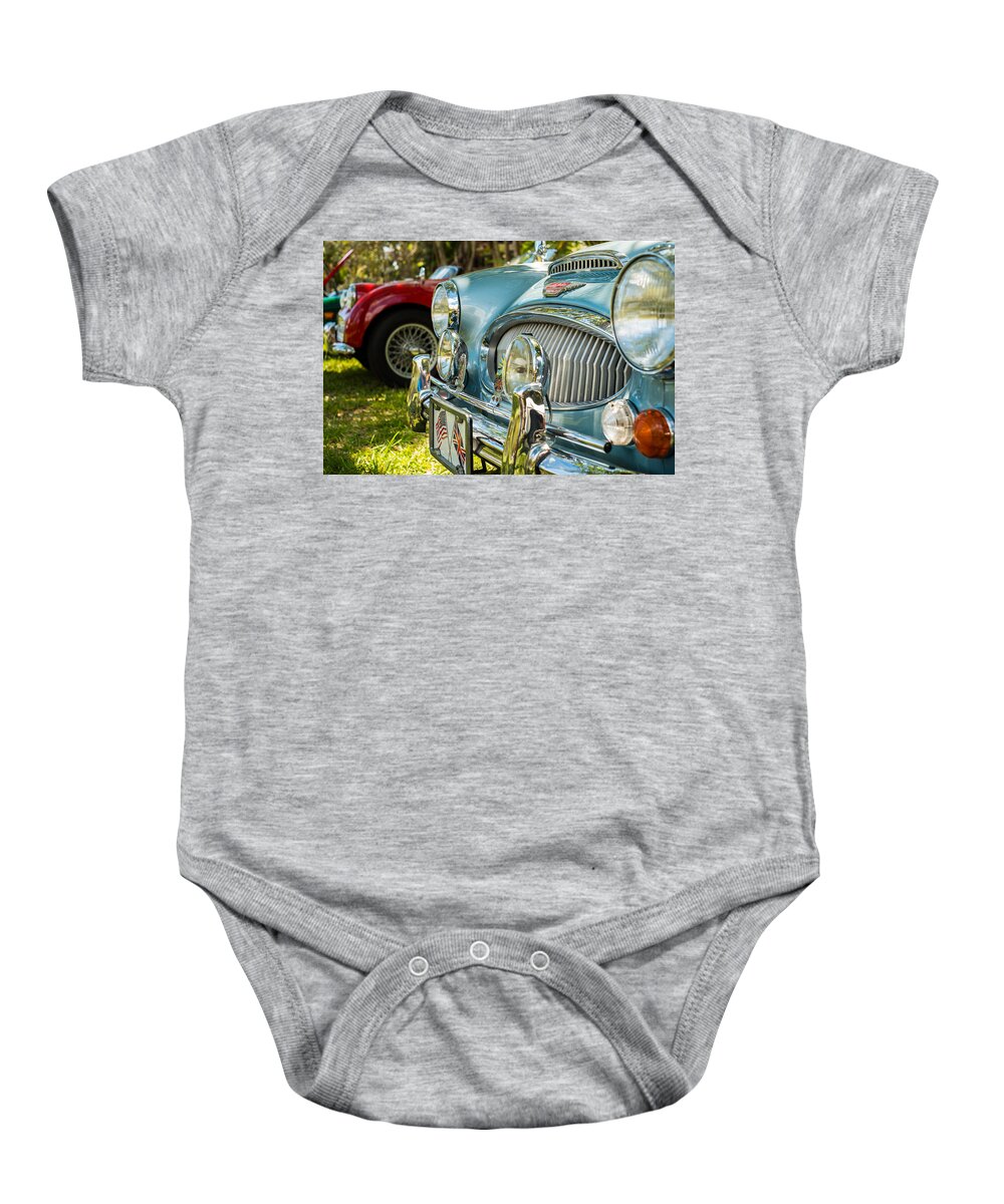 1960s Baby Onesie featuring the photograph Austin Healey by Raul Rodriguez