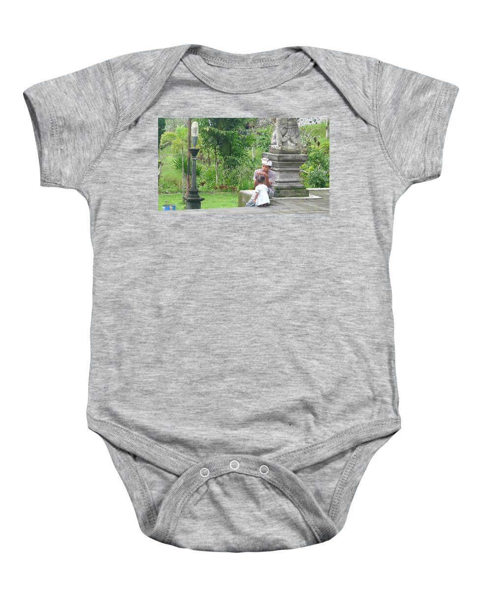  Baby Onesie featuring the photograph Bali - Father and Daughter by Nora Boghossian