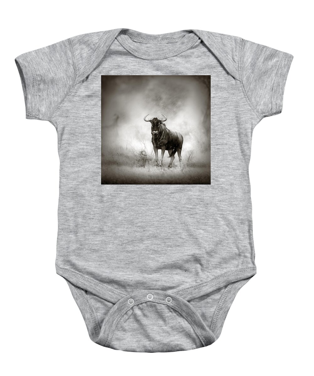 Blue Baby Onesie featuring the photograph Blue Wildebeest in rainstorm by Johan Swanepoel